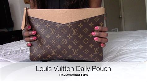 louis vuitton daily pouch review|louis vuitton change pouch.